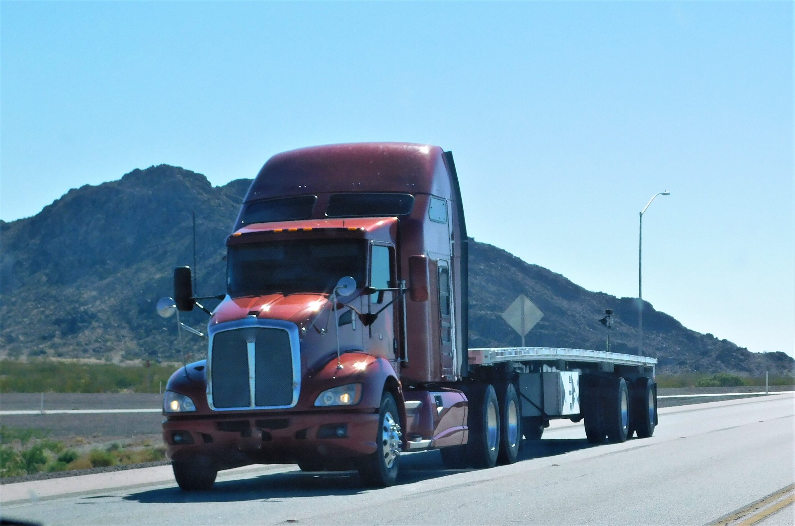 trucking-no-load-flat-bed-trailer-2025-02-22-16-08-11-utc